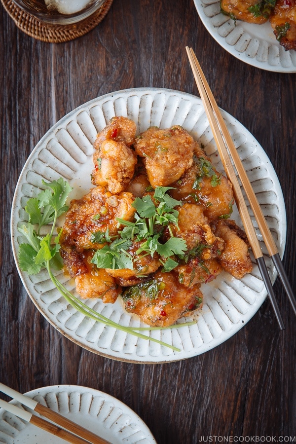 Chicken Karaage with Sweet Chili Sauce on a white plate.