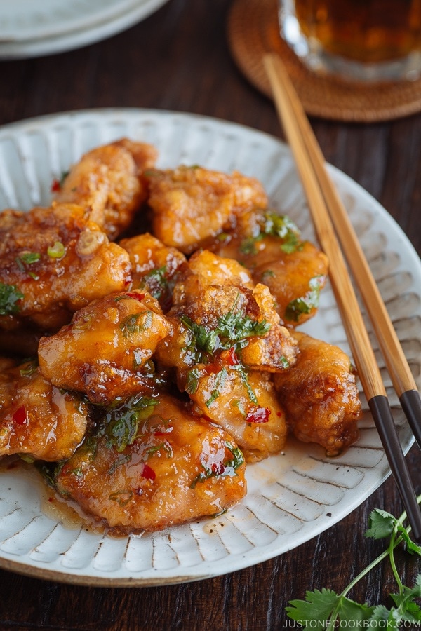Chicken Karaage with Sweet Chili Sauce on a white plate.