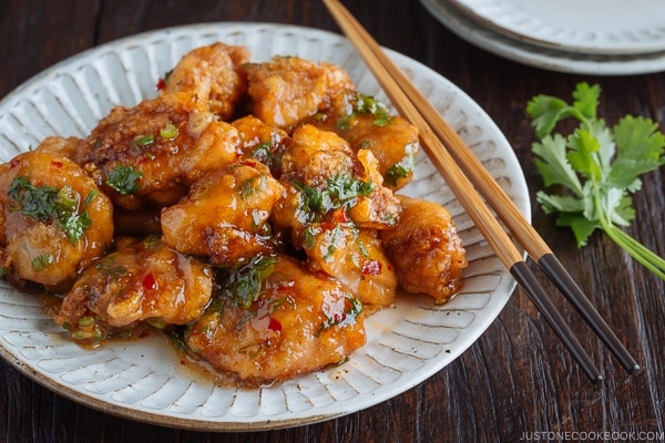 Chicken Karaage with Sweet Chili Sauce on a white plate.