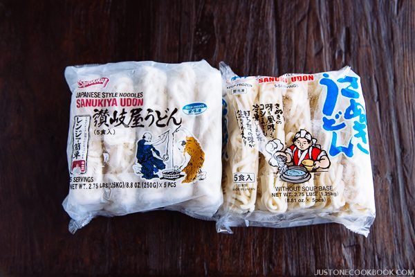 sanuki udon in the packages on the wooden table.
