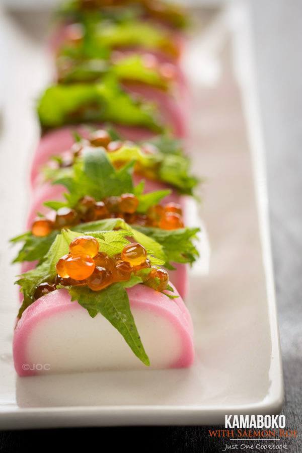 Kamaboko with Salmon Roe and Shiso on white plate.