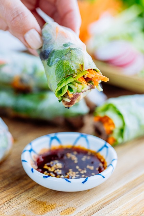 Fresh spring rolls with Yakiniku (Japanese BBQ) and julienned vegetables and fresh herbs along with homemade Yakiniku Sauce.