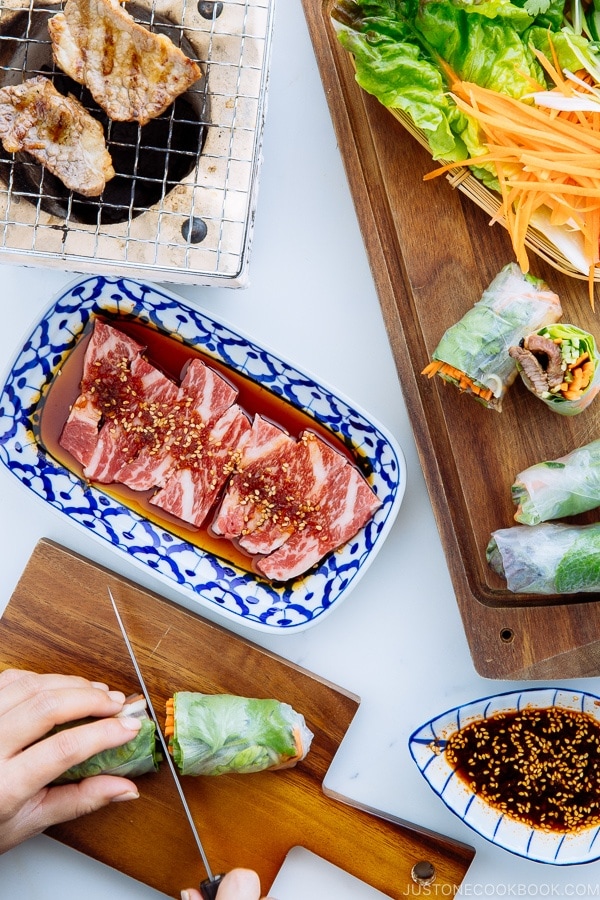 Fresh spring rolls with Yakiniku (Japanese BBQ) and julienned vegetables and fresh herbs along with homemade Yakiniku Sauce.