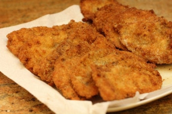 close up of fried breaded pork slices