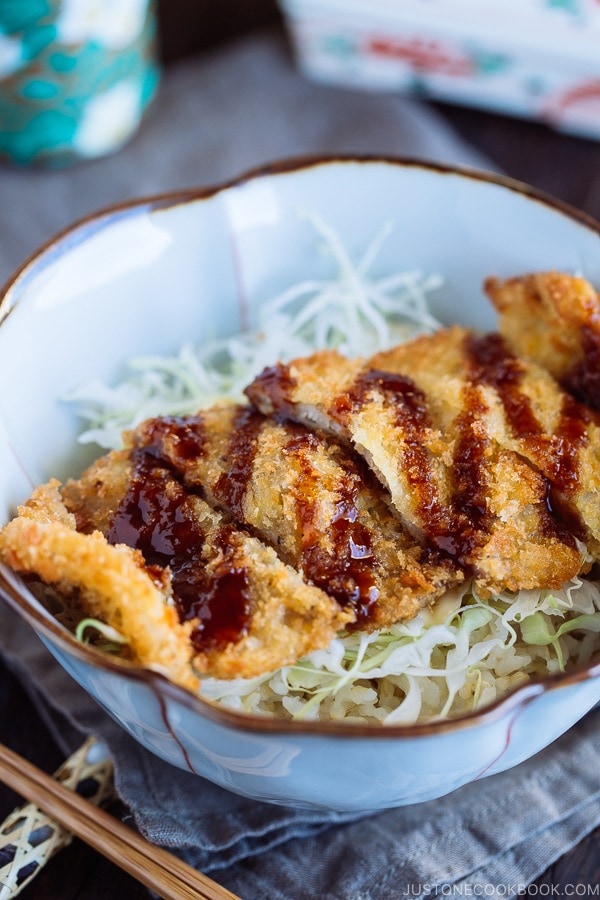 Crispy Tonkatsu over bed of rice and shredded cabbage.