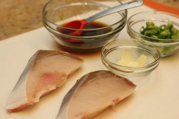 ingredients for hamachi teriyaki on a white cutting board