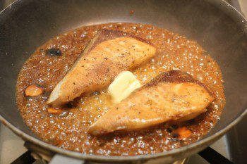 butter and seasoning added to frying pan