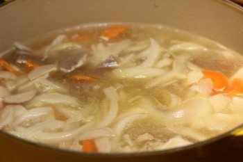 A bowl of soup inside a pot