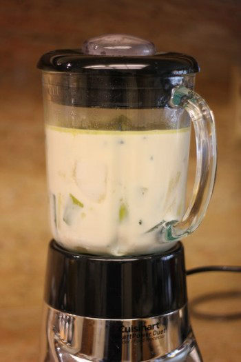 potato and leek soup with milk inside a blender