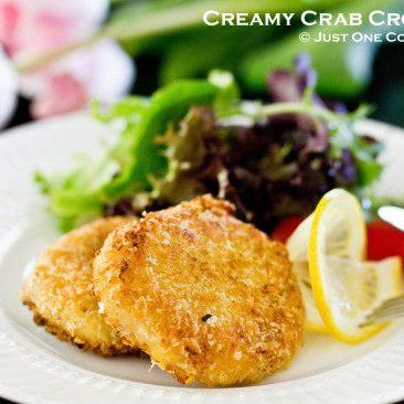 Creamy Crab Croquette and salad on a plate.