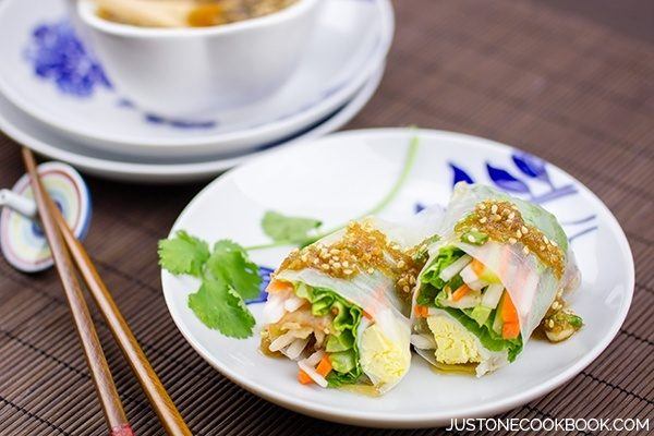 Spring Rolls with Sesame Ponzu Vinaigrette on a plate.