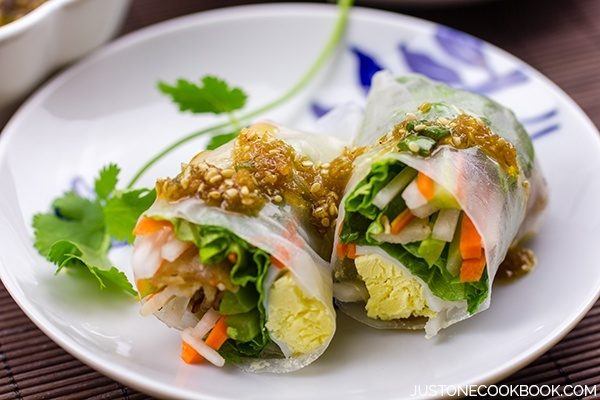 Spring Rolls with Sesame Ponzu Vinaigrette on a plate.