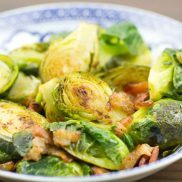 Brussels Sprouts with Bacon and Thyme on a plate.