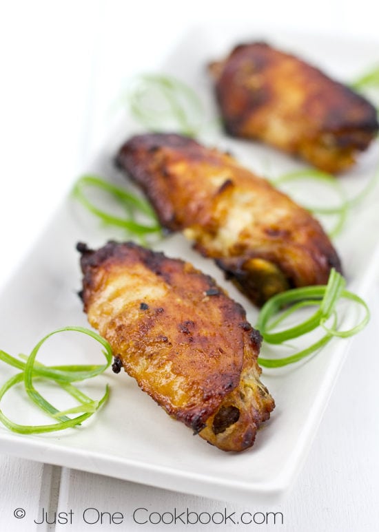 Garlic Miso Chicken Wings on a white plate.