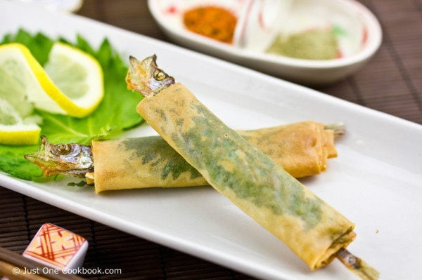 Shishamo Wrap with shiso on a plate.