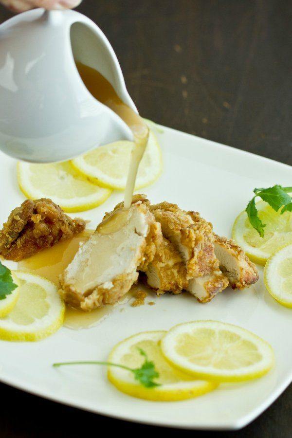 Lemon Chicken with lemon glaze on a plate.