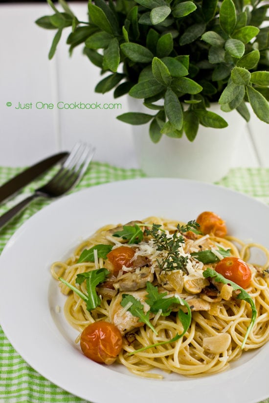 Chicken Scallopini with Lemon Butter Pasta on a white plate.