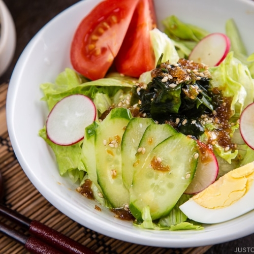 Japanese salad dressing (Wafu Dressing) over the iceberg salad.