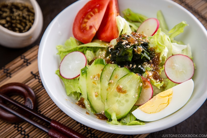 Japanese salad dressing (Wafu Dressing) over the iceberg salad.