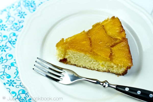 Pineapple Upside Down Cake on a plate with fork.