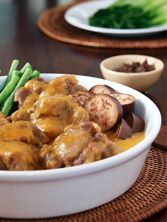 Kare Kare with string beans and eggplants in a plate.