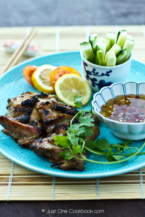 Grilled Lemongrass Chicken and salad on a plate.