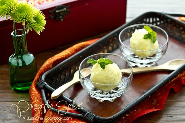 Pineapple Sorbet Recipe | JustOneCookbook.com Pineapple Sorbet in glass cups on a wooden tray.