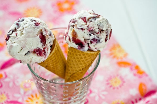 Cherry Ice Cream in cones inside a glass cup.
