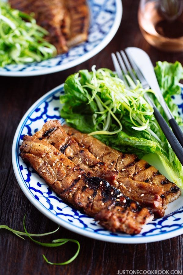 BBQ Pork Belly and salads on the plate.