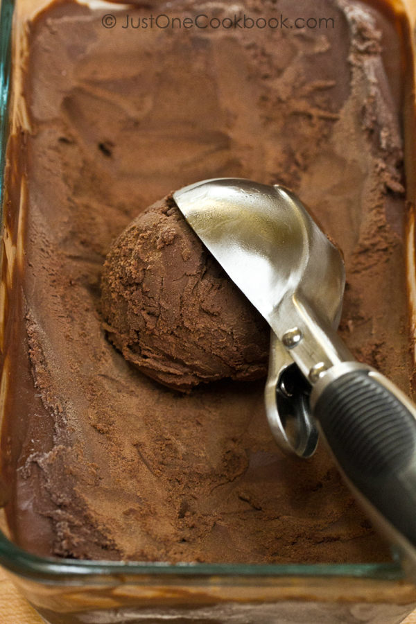 Chocolate Ice Cream and a ice cream scoop.
