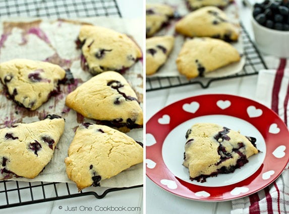 Blueberry Creme Fraiche Scones on a baking wire rack and plate.