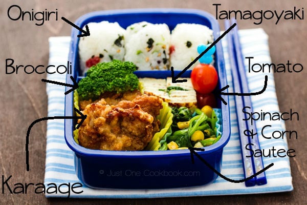 Karaage Bento box on a wooden table.