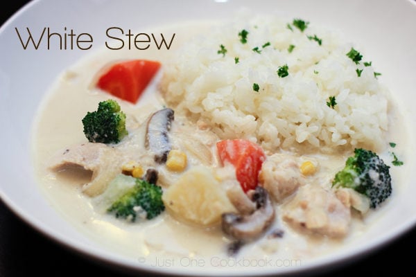 White Stew and rice on a plate.