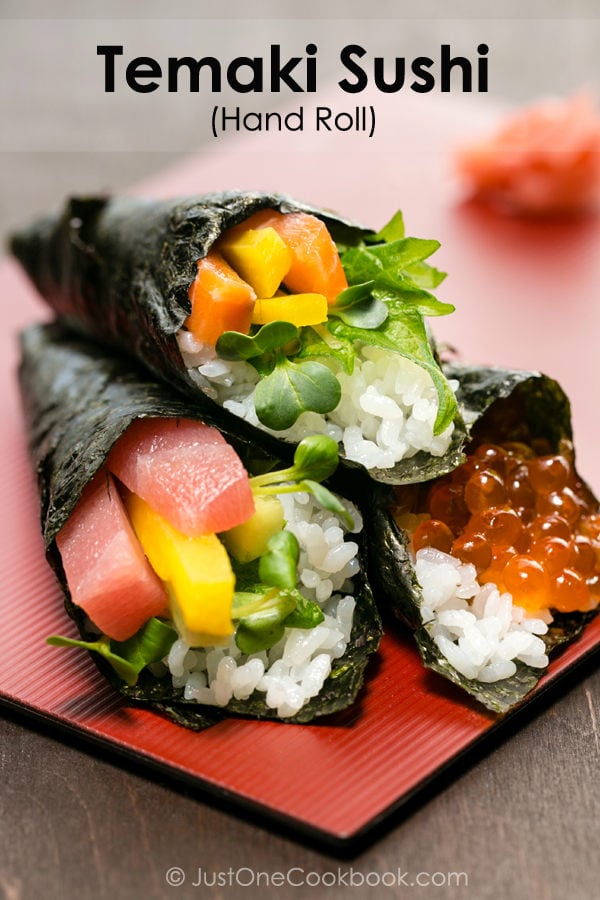 Temaki Sushi, Hand Roll on a red plate.