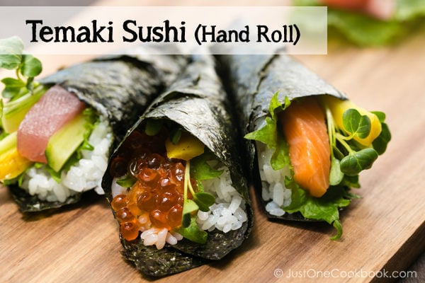 Temaki Sushi, Hand Roll Sushi on a wooden board.