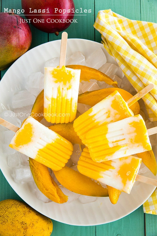 Mango Lassi Popsicles on a plate.