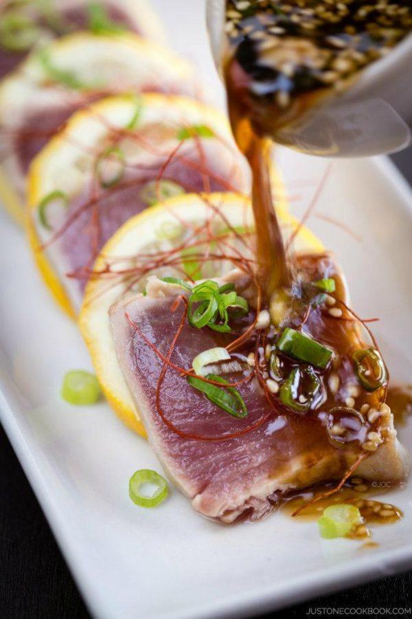 Tuna Tataki | Easy Japanese Recipes at JustOneCookbook.com Tuna Tataki with ginger ponzu sauce on a plate.