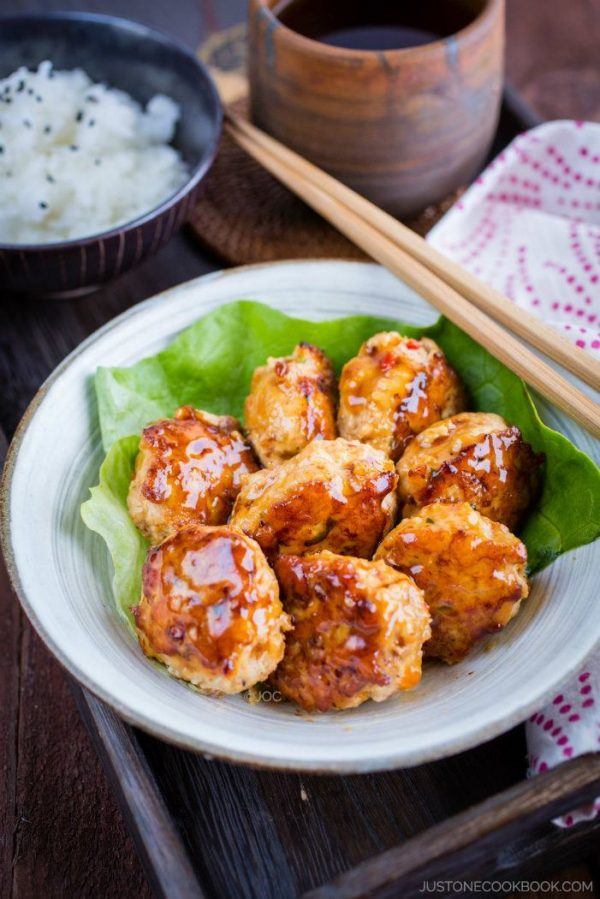 Teriyaki Chicken Meatballs in a plate with a green leaf.