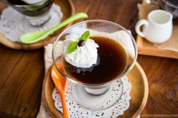 Coffee Jelly topped with a drop of whipped cream.