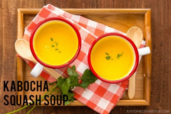 Creamy and rich Kabocha Squash Soup in soup bowls.