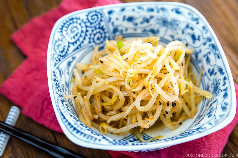 Spicy bean sprout salad served as a side in a bowl