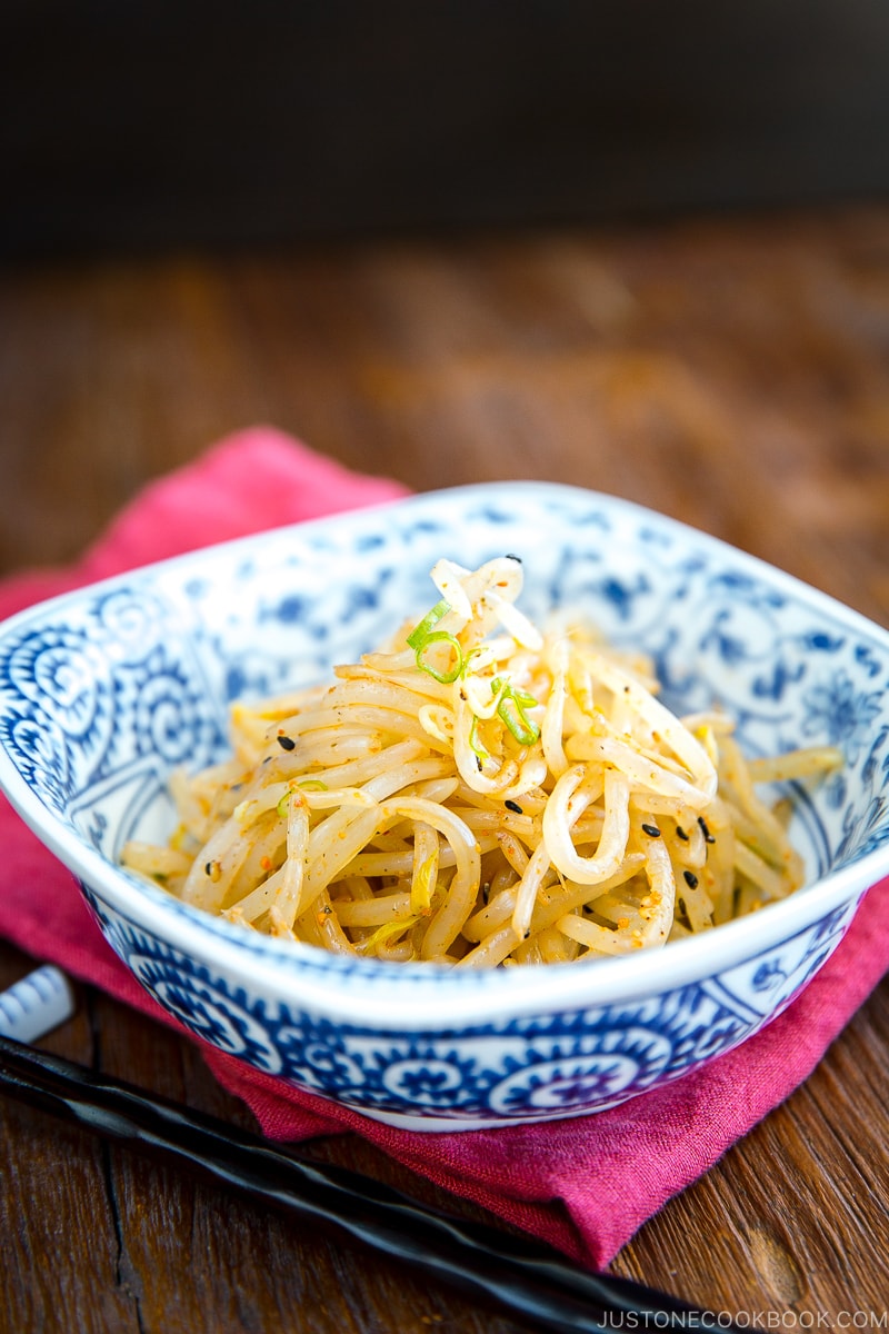 Spicy bean sprout salad served as a side in a bowl