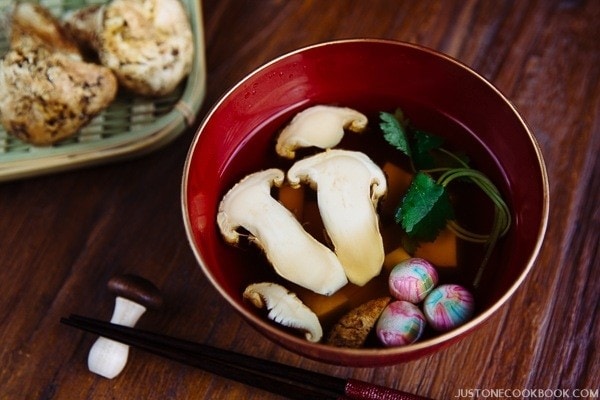Matsutake Clear Soup in Japanese soup bowl on the wooden table.