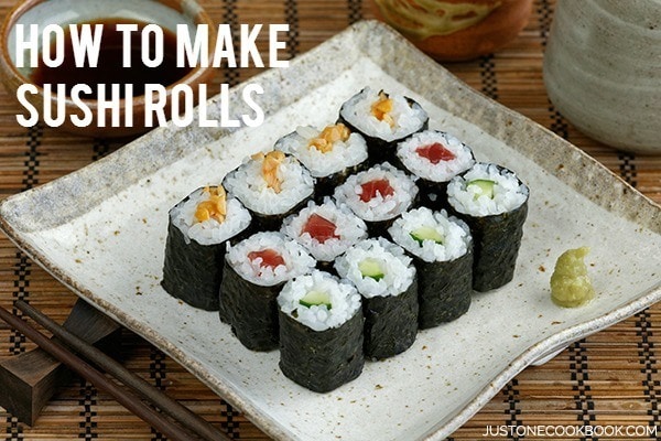Sushi rolls on a plate.