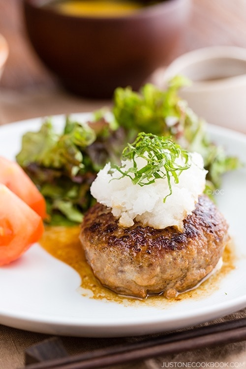 Japanese Hamburger Steak and salad on a plate.