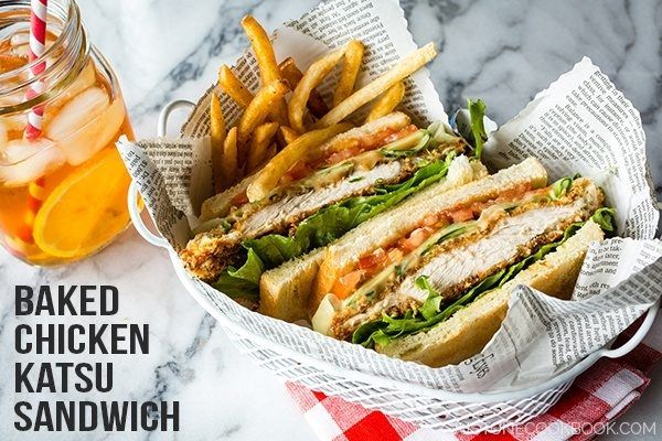 Crispy Chicken Sandwich and potatoes in a basket and ice tea.