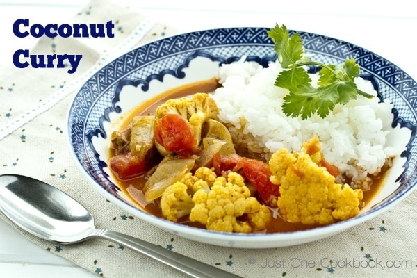 Coconut Curry and rice on a plate.