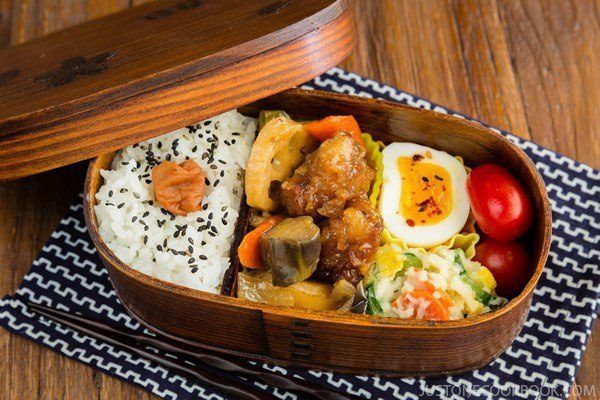 Sweet and Sour Chicken Bento on a table.