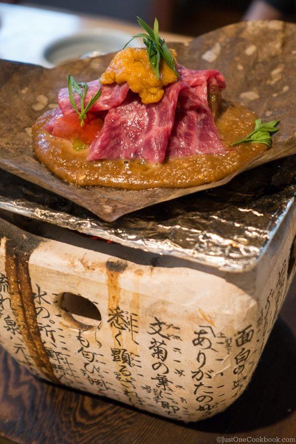 Hoba Miso with beef on a BBQ grill.