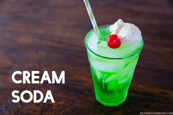 Cream Soda in a glass on the wooden table.